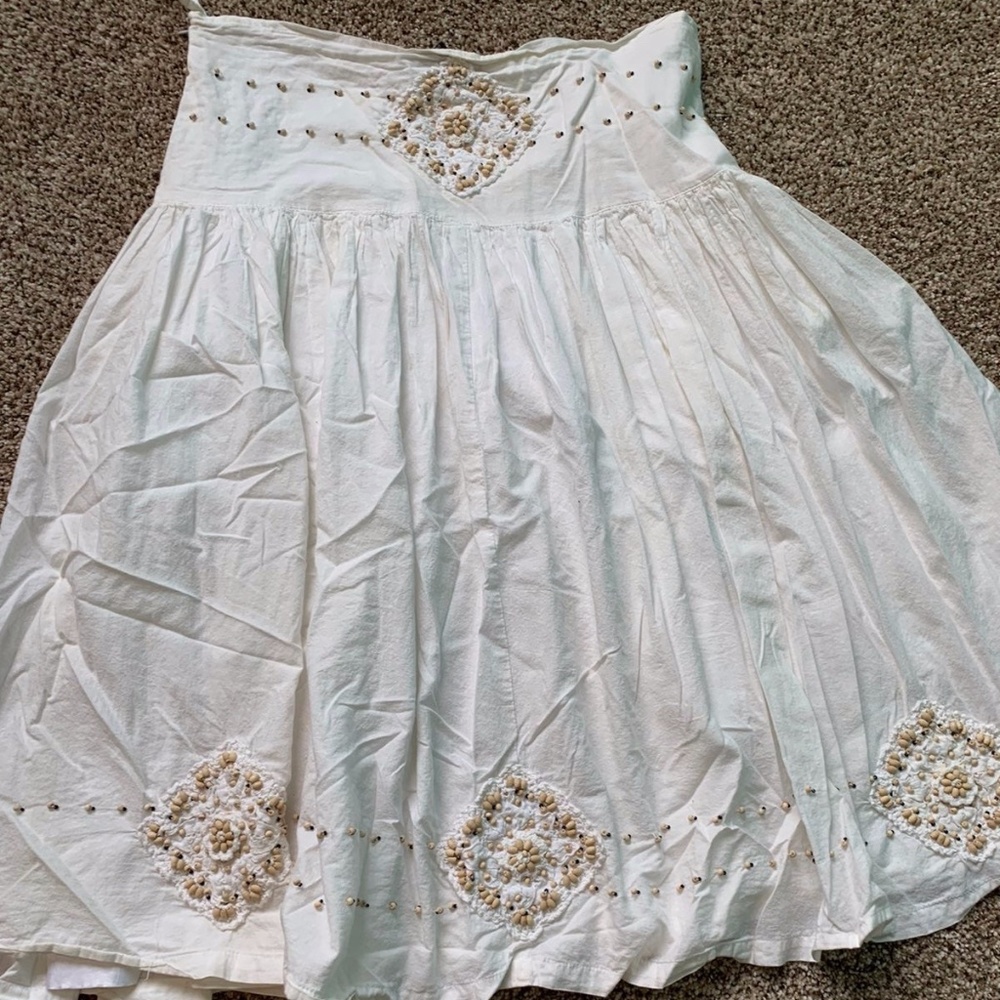 Cream skirt with beaded design